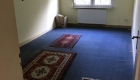 Alter Teppichboden vor Wohnungssanierung in Trier